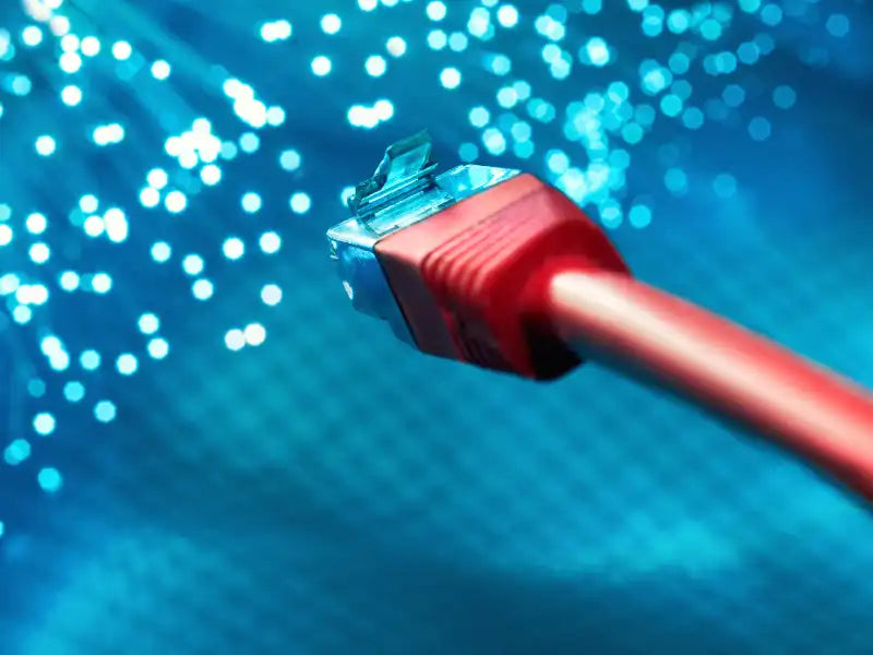 Prime Tech Support setting up network system with red cables for a business in Miami