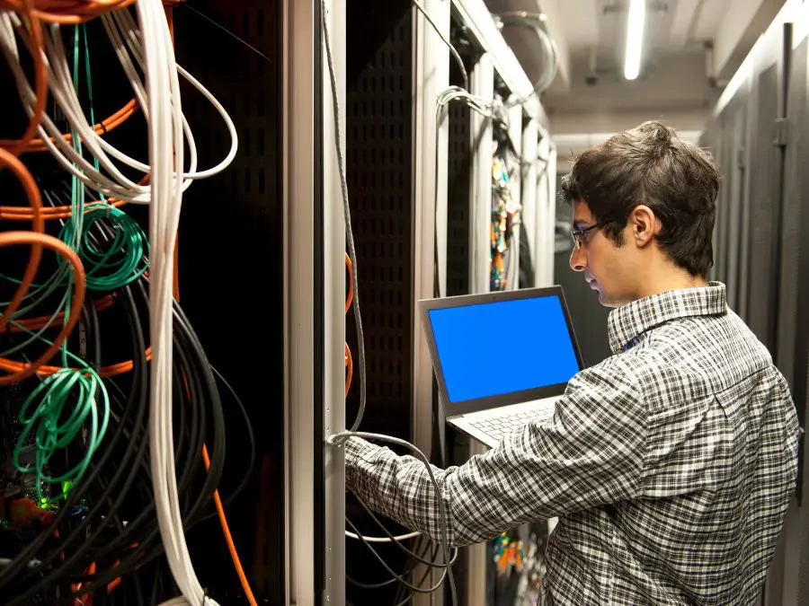 Prime Tech Support IT Technician setting up network in Miami